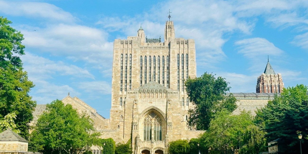 A view of a building from across the lawn