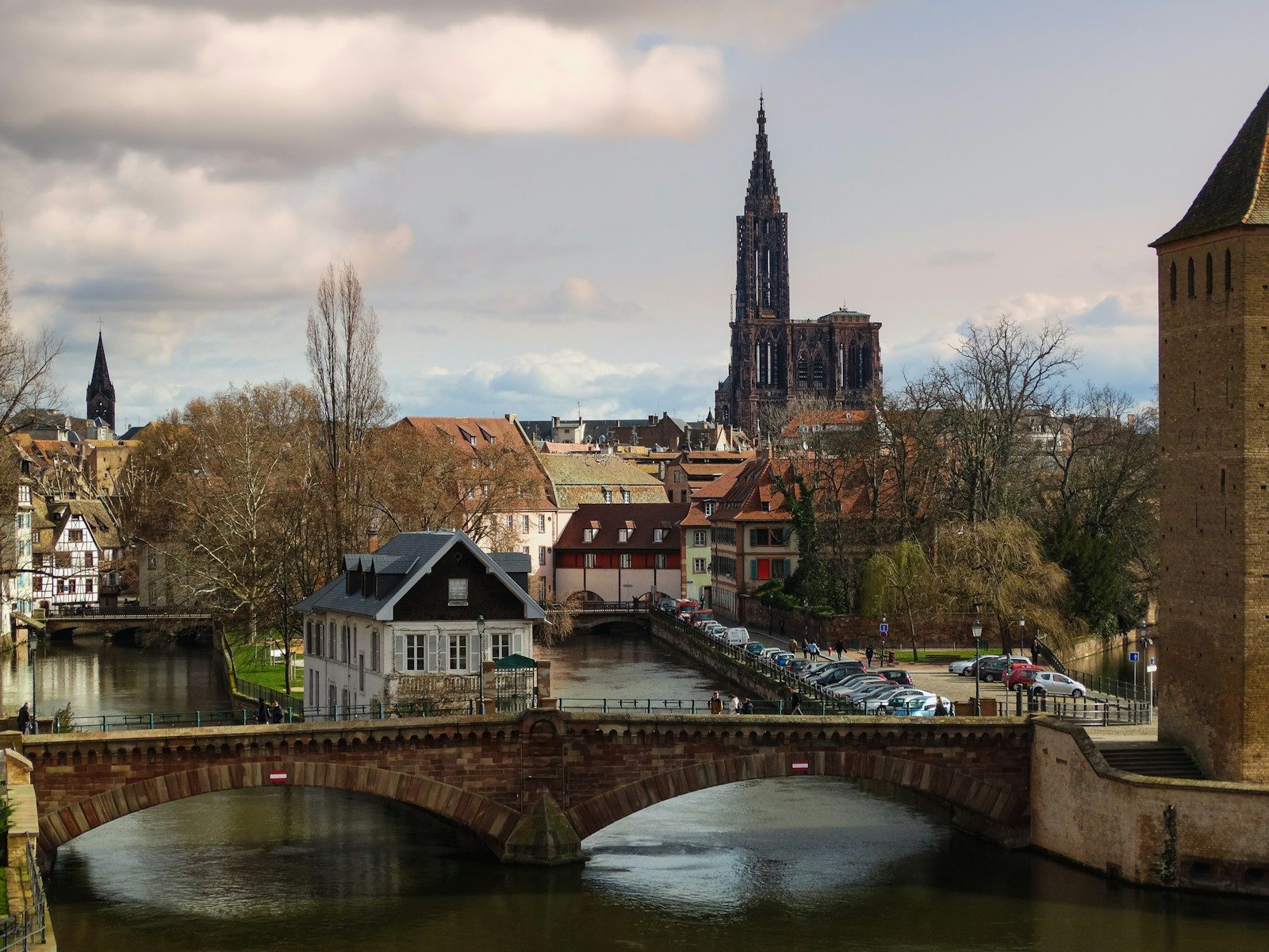 A scenic european town with a tall cathedral.